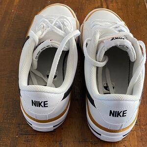 Nike White Sneakers with Gold Trim
